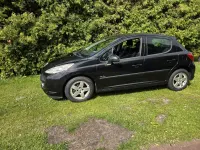 Gebraucht Peugeot 207 90 PS (66 kW) 2010 Schwarz Kleinwagen
