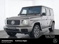 Gebraucht Mercedes G500 Exclusive 449 PS (330 kW) 2024 Manufaktur manganitgrau magno SUV
