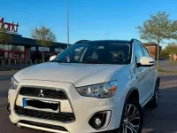 Używany Mitsubishi ASX 150 KM (110 kW) 2016 Biały SUV