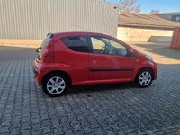 Gebraucht Peugeot 107 60 PS (44 kW) 2009 Rot Kleinwagen