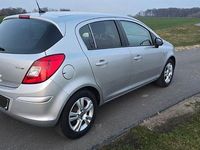 Gebraucht Opel Corsa Active 69 PS (50 kW) 2013 Silber Kleinwagen