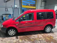 Gebraucht VW Caddy 105 PS (77 kW) 2010 Rot Van / Kleinbus
