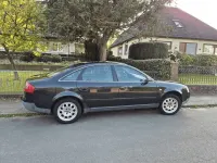Używany Audi A6 165 KM (121 kW) 2001 Czarny Sedan/Limuzyna