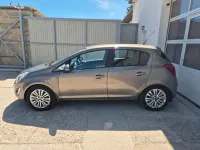 Gebraucht Opel Corsa Edition 75 PS (55 kW) 2011 Braun Kleinwagen