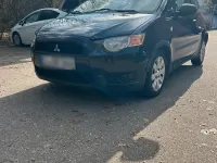 Second-hand Mitsubishi Colt 75 CP (55 kW) 2011 Negru Hatchback