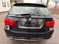 Gebraucht BMW 320 184 PS (135 kW) 2010 Schwarz Kombi