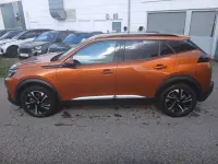 Gebraucht Peugeot e-2008 Allure 100 kW (136 PS) 2021 Orange fusion (metallic) SUV