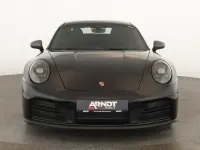 Gebraucht Porsche 911 Carrera T 394 PS (289 kW) 2025 Tiefschwarzmetallic Coupé
