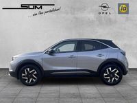 Gebraucht Opel Mokka-e Elegance 100 kW (136 PS) 2023 Kontrast grau/quarz silber SUV