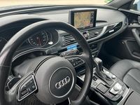 Second-hand Audi A6 Design 320 CP (235 kW) 2016 Gri Break