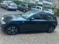 Second-hand BMW 116 122 CP (89 kW) 2009 Negru Hatchback