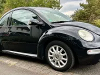 Gebraucht VW New Beetle 102 PS (75 kW) 2004 Schwarz Kleinwagen