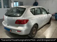 Używany Mazda 3 Comfort 84 KM (61 kW) 2004 Srebrny Sedan/Limuzyna