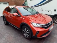 Używany VW Taigo Move 110 KM (80 kW) 2024 Czerwony SUV