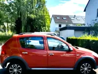 Gebraucht Dacia Sandero Stepway 80 PS (58 kW) 2010 Rot Kleinwagen
