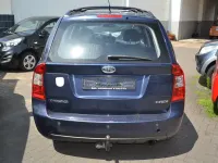 Gebraucht Kia Carens LX 140 PS (102 kW) 2009 Blau Van / Kleinbus