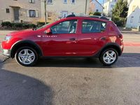 Gebraucht Dacia Sandero Prestige 90 PS (66 kW) 2015 Feuerrot Kleinwagen