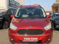 Gebraucht Ford Tourneo Courier Titanium 101 PS (74 kW) 2014 Orange Van / Kleinbus