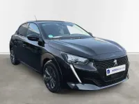 Gebraucht Peugeot e-208 Allure 100 kW (136 PS) 2023 Lackierung schwarz perla nera/ty (metallic) Kleinwagen