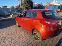 Second-hand Mazda 2 Active 75 CP (55 kW) 2010 Portocaliu Hatchback