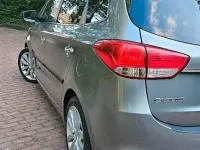 Gebraucht Kia Carens 136 PS (100 kW) 2015 Silber Van / Kleinbus
