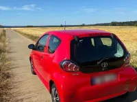 Gebraucht Toyota Aygo 68 PS (50 kW) 2010 Rot Kleinwagen
