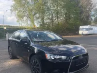 Second-hand Mitsubishi Lancer 143 CP (105 kW) 2009 Negru Berlinǎ