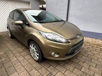 Gebraucht Ford Fiesta Trend 82 PS (60 kW) 2012 Braun Kleinwagen