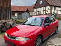 Gebraucht Mitsubishi Carisma 90 PS (66 kW) 1997 Rot Limousine