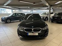 Gebraucht BMW 320e Performance 163 PS (119 kW) 2022 Schwarz Kombi