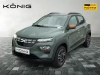Gebraucht Dacia Spring Extreme 47 kW (65 PS) 2023 Olivgrün Kleinwagen