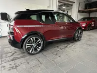 Gebraucht BMW i3 Performance 183 kW (250 PS) 2022 Aventurinrot m.akz. frozen gre Kleinwagen