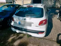 Gebraucht Peugeot 206 60 PS (44 kW) 2011 Weiß Kleinwagen