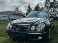 Second-hand Mercedes E200 163 CP (119 kW) 2004 Negru Berlinǎ