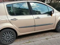 Używany Renault Modus 75 KM (55 kW) 2005 Złoty Minivan