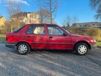 Gebraucht Peugeot 309 75 PS (55 kW) 1992 Rot Kleinwagen