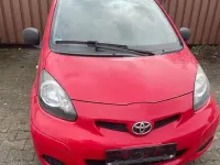 Gebraucht Toyota Aygo 68 PS (50 kW) 2009 Rot Kleinwagen