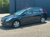 Gebraucht Hyundai i30 Comfort 105 PS (77 kW) 2011 Schwarz Kombi