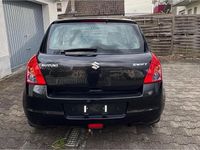 Gebraucht Suzuki Swift 75 PS (55 kW) 2009 Schwarz Kleinwagen