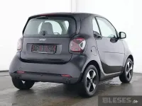 Gebraucht Smart ForTwo Coupé Exclusive 60 kW (82 PS) 2024 Bodypanels in black Kleinwagen
