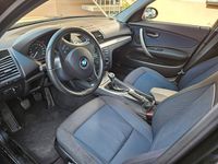 Gebraucht BMW 116 122 PS (89 kW) 2010 Schwarz Kleinwagen