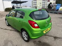 Gebraucht Opel Corsa 101 PS (74 kW) 2013 Grün Kleinwagen