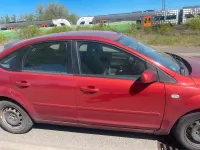 Używany Ford Focus 101 KM (74 kW) 2009 Czerwony Sedan/Limuzyna