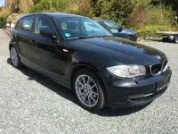 Second-hand BMW 116 122 CP (89 kW) 2009 Negru Hatchback