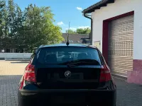 Gebraucht BMW 116 122 PS (89 kW) 2010 Schwarz Kleinwagen