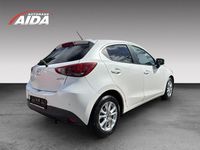 Używany Mazda 2 Exclusive 90 KM (66 kW) 2015 Biały Sedan/Limuzyna