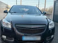 Używany Opel Insignia 200 KM (147 kW) 2012 Purpurowy Sedan/Limuzyna