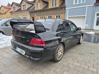 Second-hand Mitsubishi Lancer Evolution 280 CP (205 kW) 2001 Negru Berlinǎ