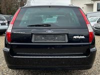 Gebraucht Ford Mondeo Titanium 125 PS (91 kW) 2007 Pantherschwarz metallic Kombi