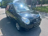 Gebraucht Kia Picanto Attract 65 PS (47 kW) 2010 Schwarz Kleinwagen